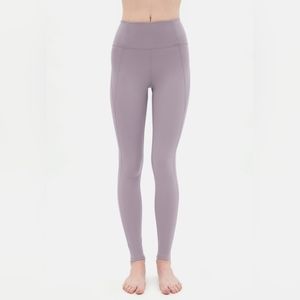 Girlfriend Collective High Rise Compressive Leggings in Macaron Medium